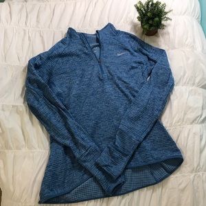 Blue Nike pullover with reflection and perks